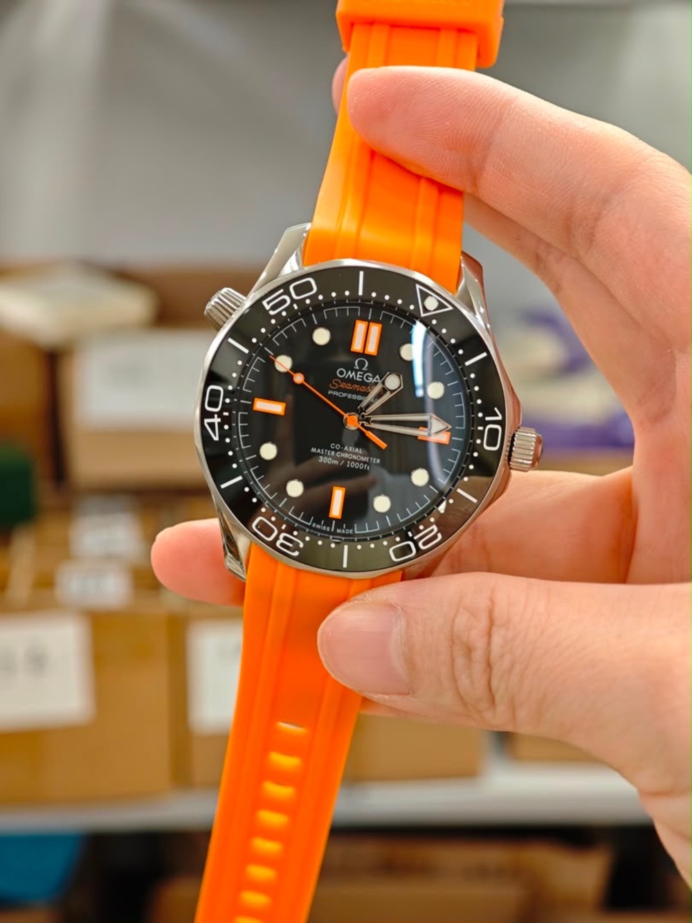 Omega Automatic Black Dial Watch with Bright Orange Strap